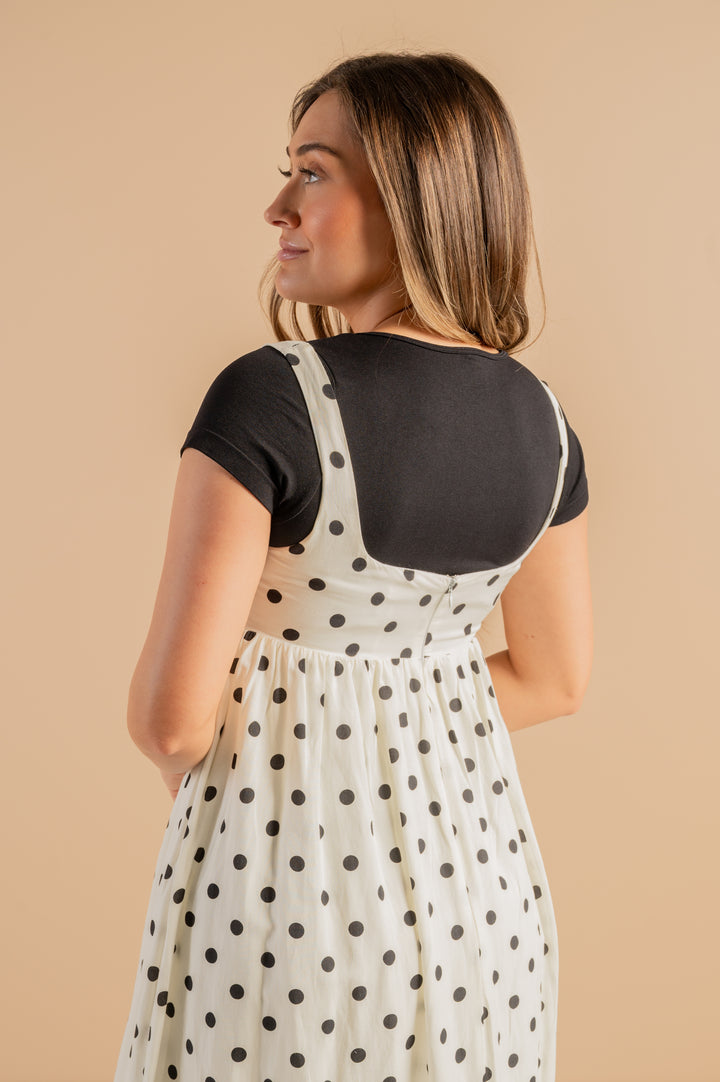 zara dress polka dot new from ZARA!  Yay or nay?  The halter neck and asymmetrical hem, so lovely!  #zara #zaraoutfit #outtinspo #polkadotdress , Comment SHOP below to receive a DM with the link to neckline with lace trim and drawstring Zara Black and Cream Polka